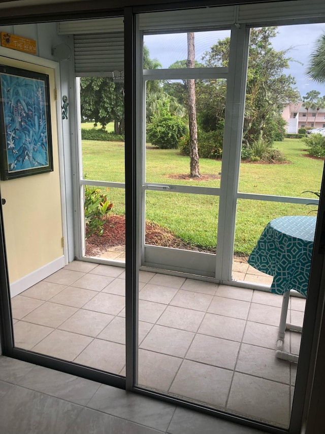 entryway with tile patterned floors