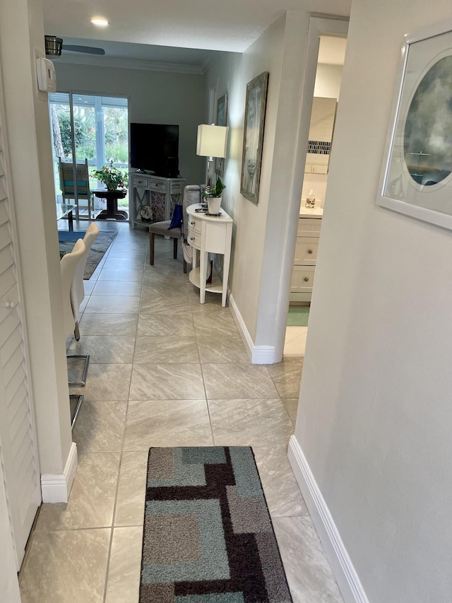 hallway featuring light tile patterned flooring