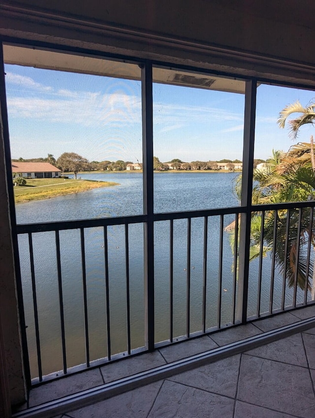 interior space featuring a water view