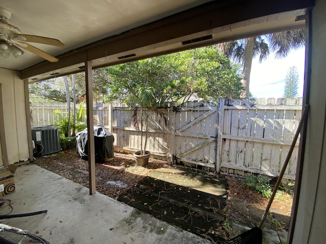 view of patio with central AC unit, ceiling fan, and a grill