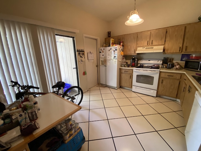 kitchen featuring light tile patterned floors, decorative light fixtures, and white appliances