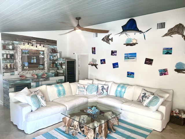 living room featuring ceiling fan, lofted ceiling, and wooden ceiling