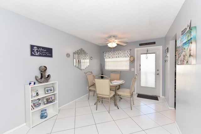 dining room featuring ceiling fan and light tile patterned floors