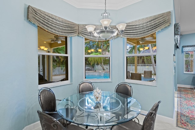 tiled dining space featuring ornamental molding