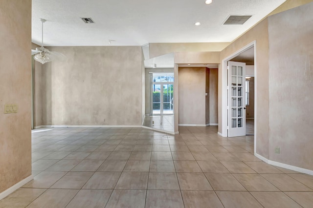 unfurnished room featuring ceiling fan