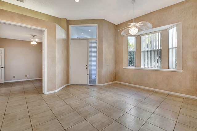 interior space featuring ceiling fan