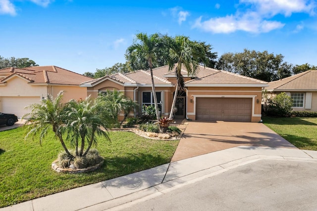 single story home featuring a garage and a front lawn