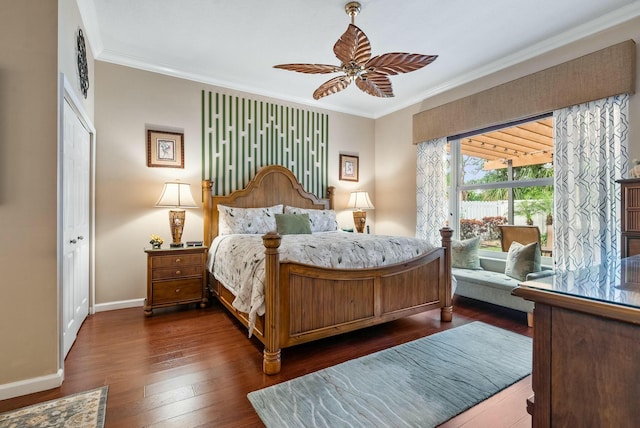 bedroom with ceiling fan, dark hardwood / wood-style flooring, ornamental molding, and a closet