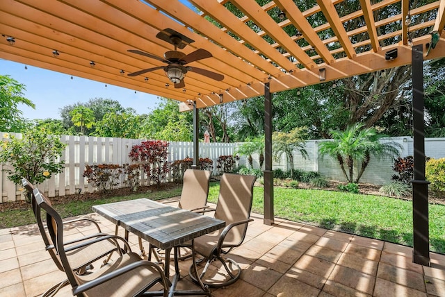 view of patio with ceiling fan and a pergola