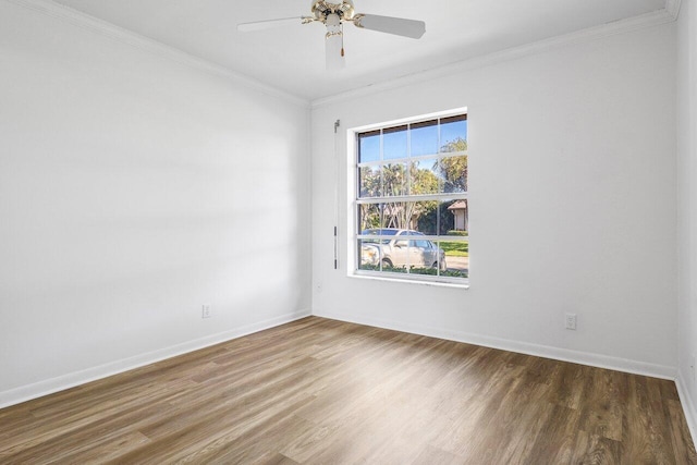 unfurnished room featuring wood-type flooring, ceiling fan, and crown molding