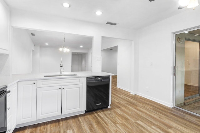 kitchen with dishwasher, light hardwood / wood-style flooring, and sink