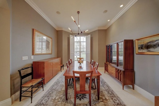 dining area featuring an inviting chandelier and ornamental molding