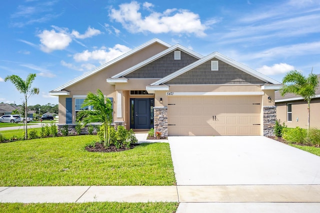 craftsman inspired home featuring a front yard and a garage