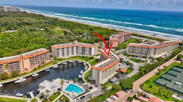 birds eye view of property featuring a water view