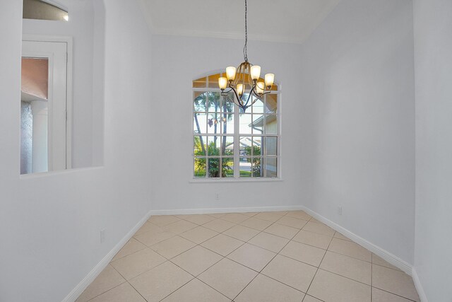 unfurnished dining area featuring light tile patterned floors and an inviting chandelier