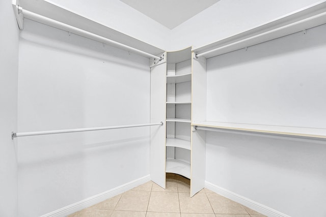 walk in closet featuring light tile patterned floors