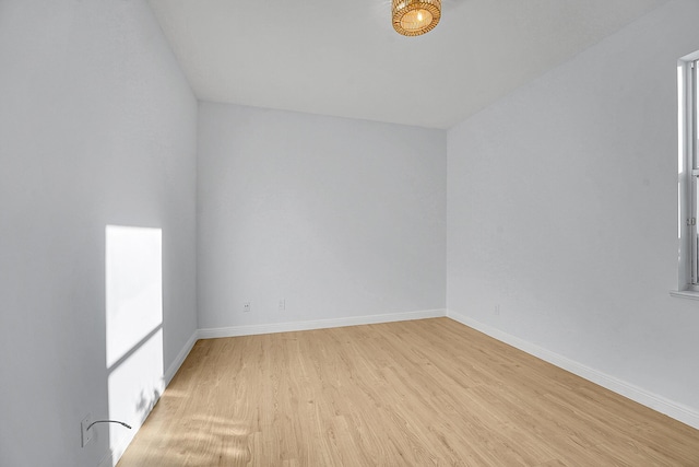 unfurnished room featuring light wood-type flooring