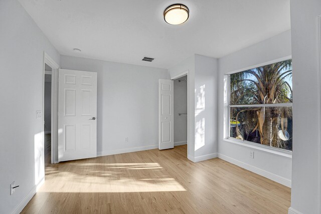 empty room featuring light hardwood / wood-style floors