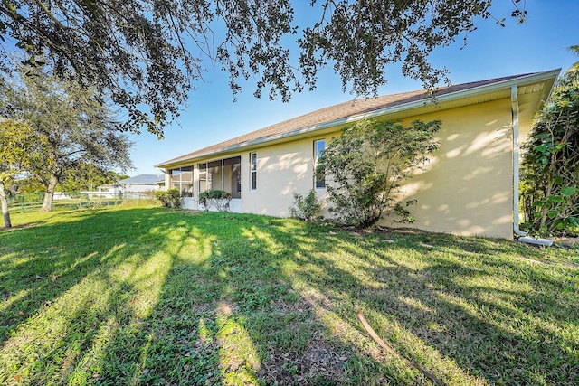 view of front of home with a front lawn