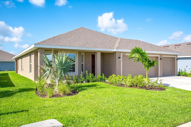 ranch-style home featuring a front yard and a garage