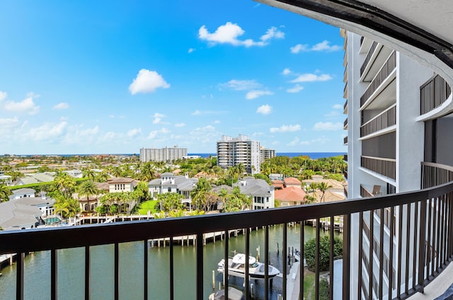 balcony featuring a water view