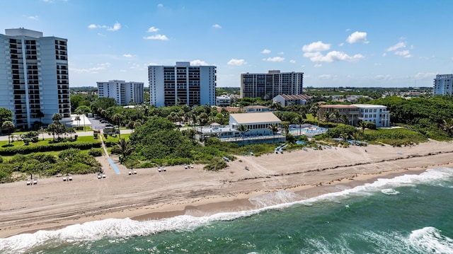 bird's eye view with a beach view, a city view, and a water view