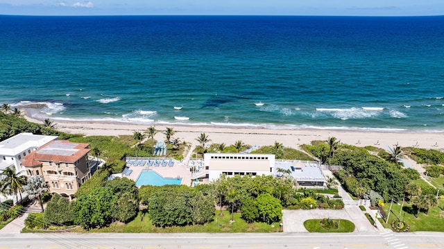 bird's eye view featuring a beach view and a water view