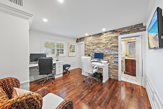 office area with ornamental molding and dark wood-type flooring