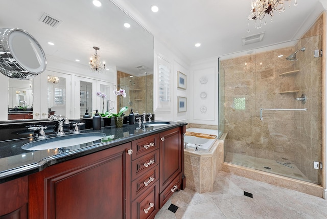 bathroom featuring separate shower and tub, tile patterned floors, vanity, and a chandelier