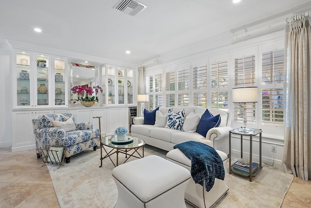 tiled living room with crown molding