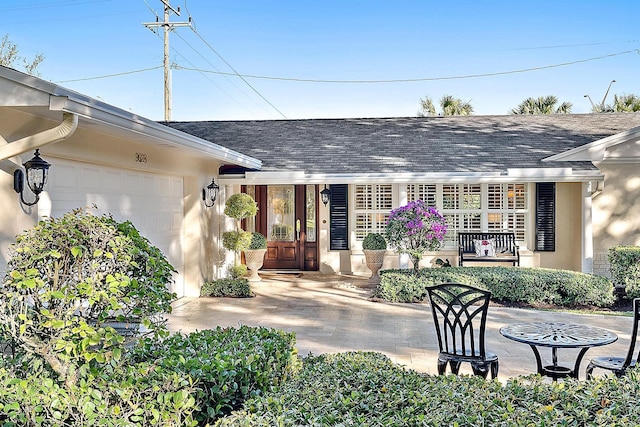 view of front of home with a garage