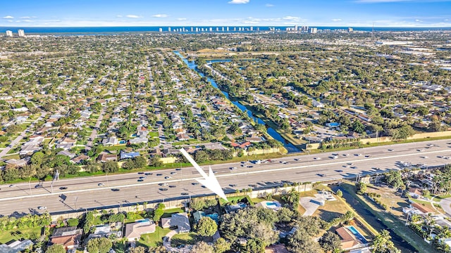 drone / aerial view with a water view