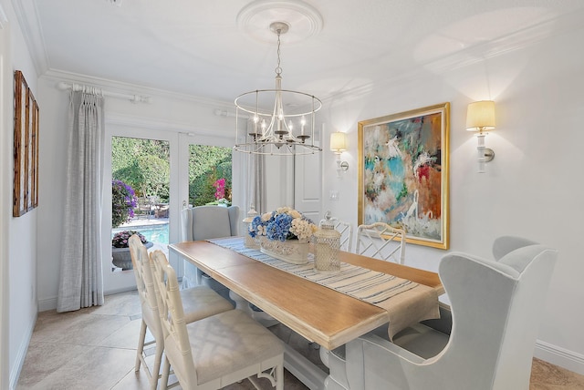 tiled dining room featuring an inviting chandelier and ornamental molding