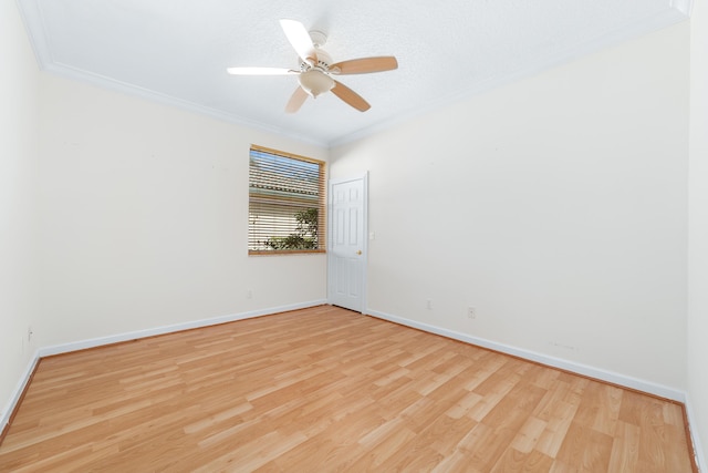 unfurnished room featuring a textured ceiling, light hardwood / wood-style flooring, ceiling fan, and ornamental molding