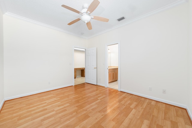 unfurnished bedroom with connected bathroom, light hardwood / wood-style floors, ceiling fan, and ornamental molding