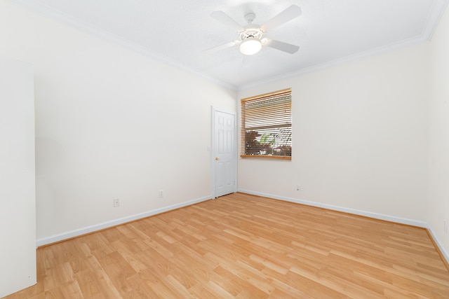 empty room featuring light hardwood / wood-style floors, ceiling fan, and ornamental molding