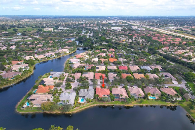 drone / aerial view featuring a water view