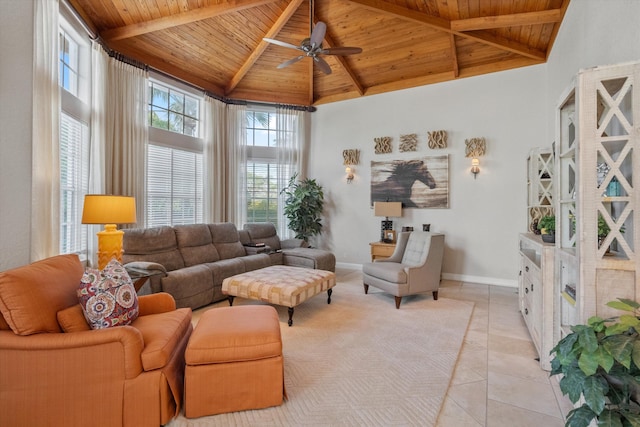 living room featuring a high ceiling, beam ceiling, wooden ceiling, and light tile patterned flooring