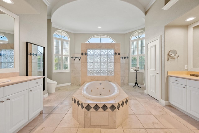 bathroom with vanity, tile patterned floors, ornamental molding, and separate shower and tub