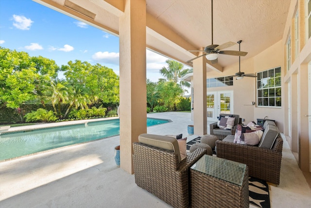 view of patio featuring ceiling fan, french doors, and an outdoor hangout area