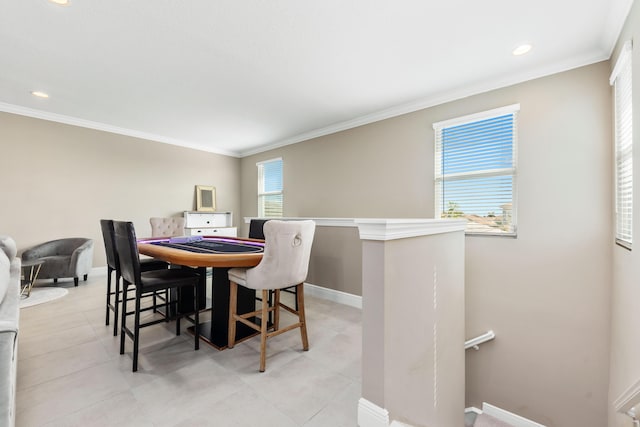 dining room featuring ornamental molding