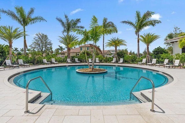 view of swimming pool featuring a patio