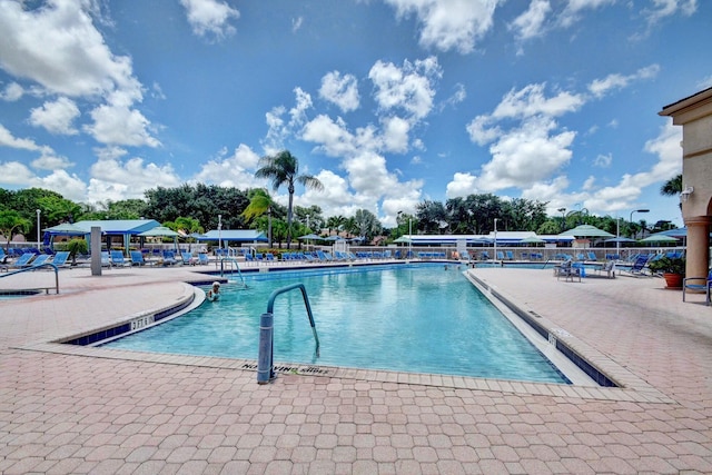 pool with a patio