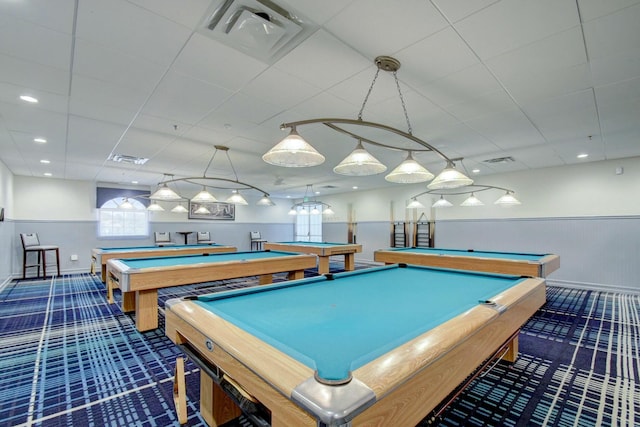 rec room with a wainscoted wall, billiards, a paneled ceiling, and visible vents