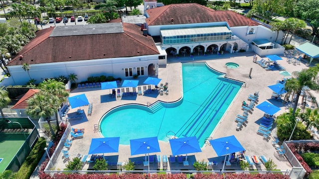 pool with a patio area