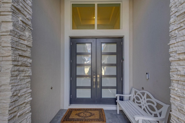 doorway to property with french doors