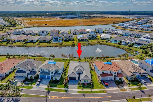 aerial view featuring a water view