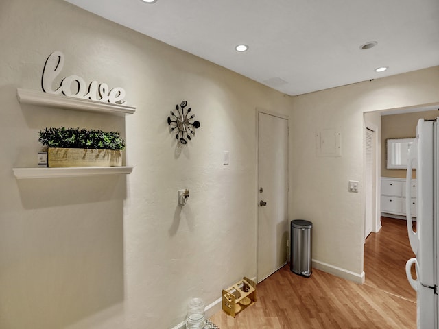 hallway featuring hardwood / wood-style floors