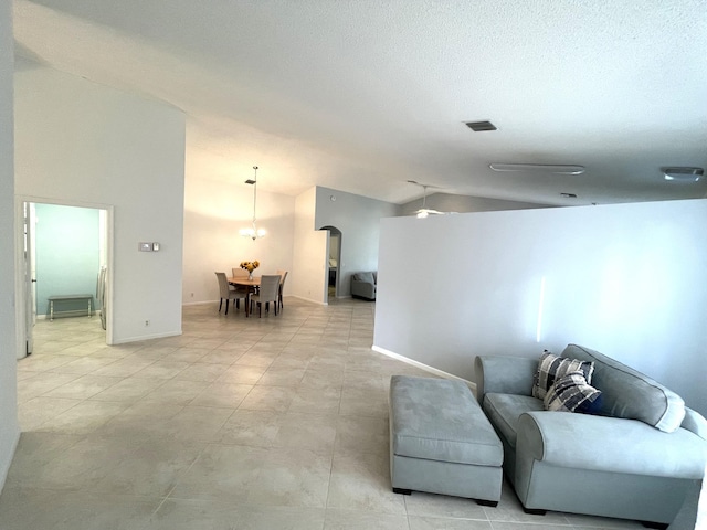 living room with vaulted ceiling