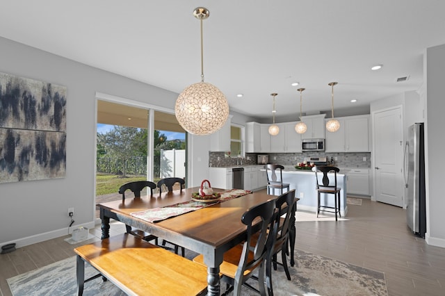 dining area featuring light hardwood / wood-style flooring